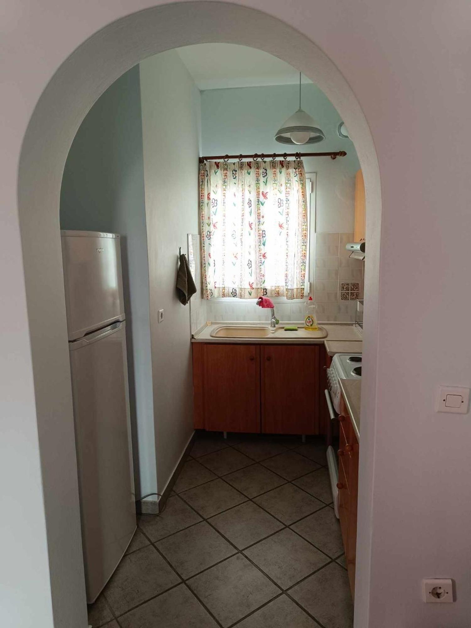 Athina Rooms Karvounades Bagian luar foto