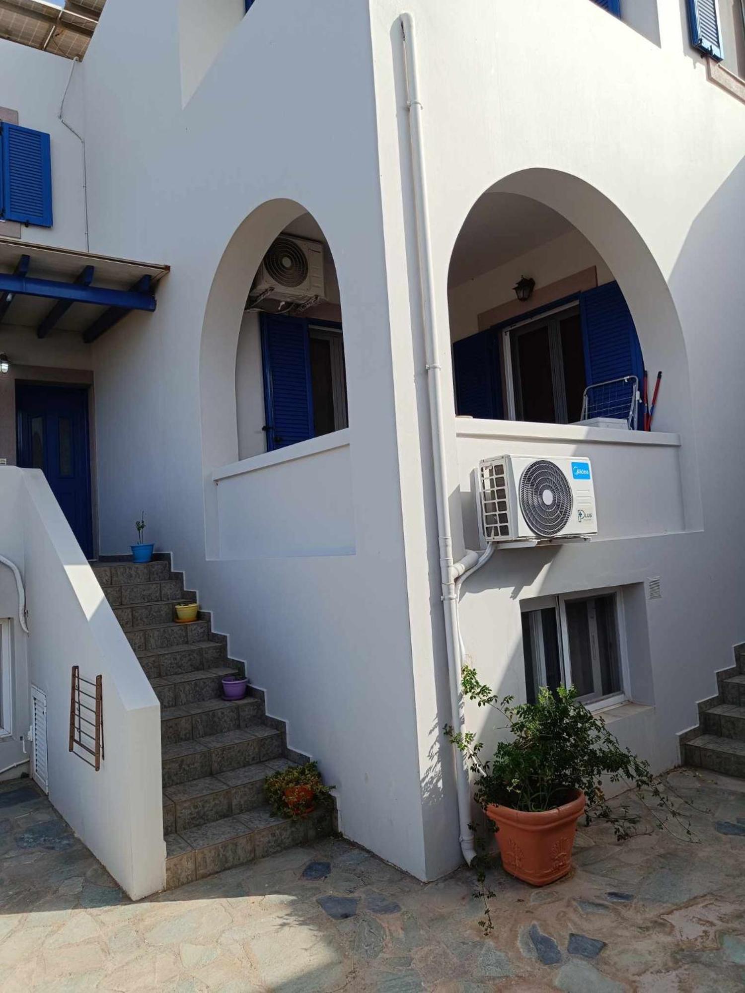 Athina Rooms Karvounades Bagian luar foto